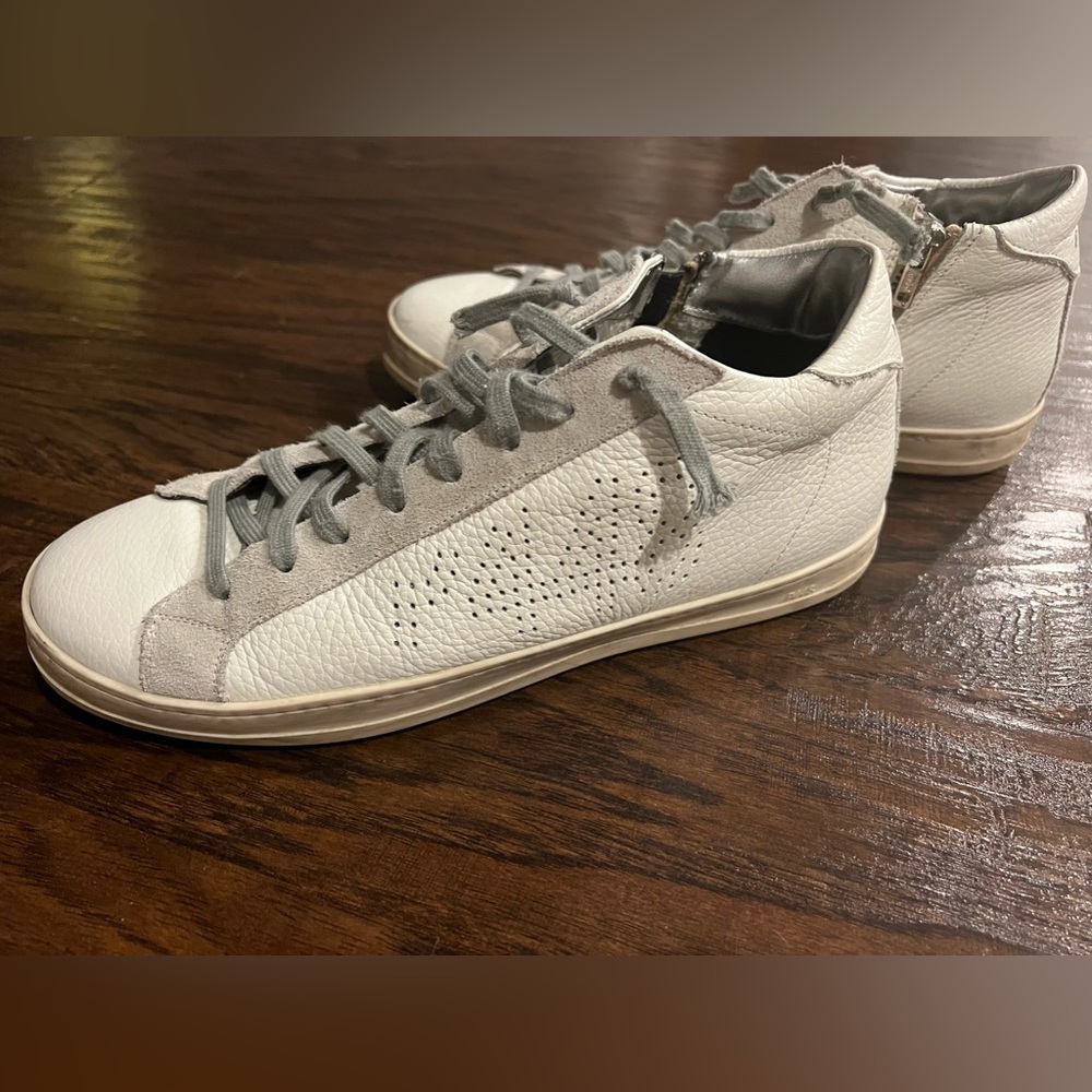 Mid rise P448 perforated. These are in like new condition, barely worn.